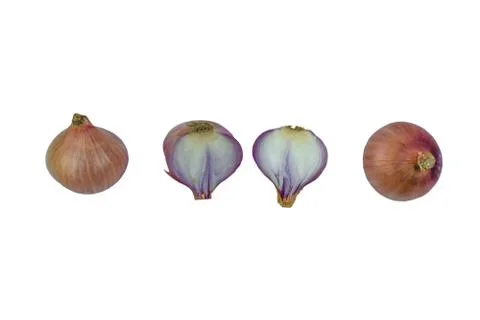 Three medium sized onion placed beside one another while one is divided in tw Stock Photos