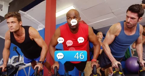 Three men dropping into kettlebell push-ups while visualizing comment counter Stock Footage 317833766
