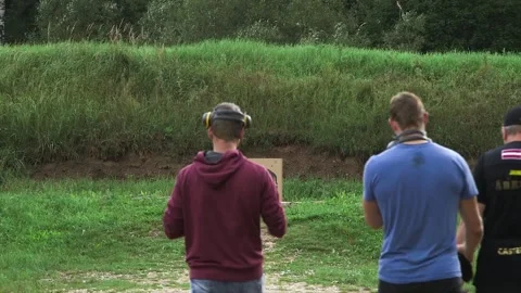 Three men go to the boar target Stock Footage 248846461