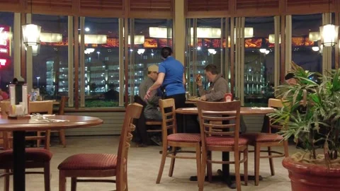 Three Men In Restaurant Dining Discussing Politics Business The Weather At Night Stock Footage 225096704