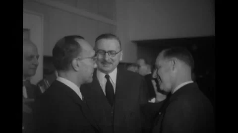 Three men in suits talking at Nato Conference Stock Footage 36422426