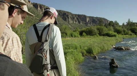 Three men walking with landing net 動画素材 59899199