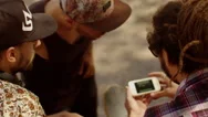 Three Men Watching A Clip On The Phone Stock Footage