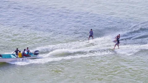 Three men water skiing at Sur, Oman Video stock 196004956