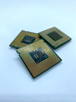 Three micro processors stack closeup view isolated on white Stock Photos