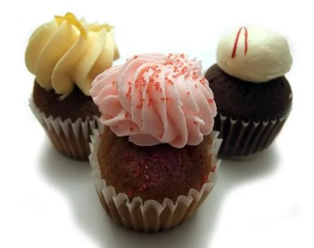 Three mini cupcakes Stock Photos