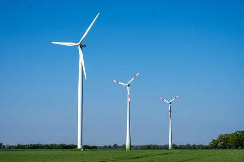 Three modern wind turbines Stock Photos