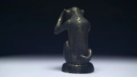Three monkey statues on black background Stock Footage 162312315