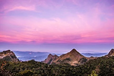Three mountain with purple sky Stock Photos