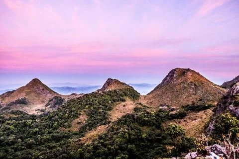 Three mountain with purple sky Stock Photos