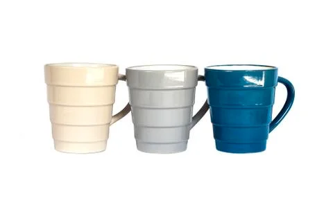 Three mugs isolated on white background Stock Photos