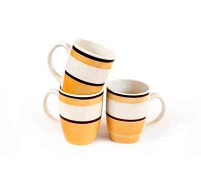 Three mugs isolated on white background Stock Photos