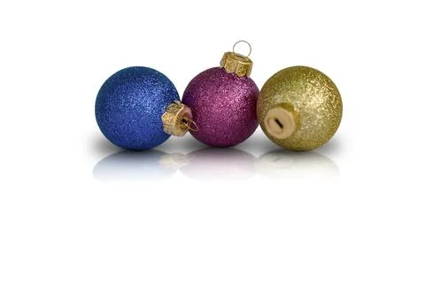 Three multi-colored Christmas balls on a white background. Isolate Stock Photos