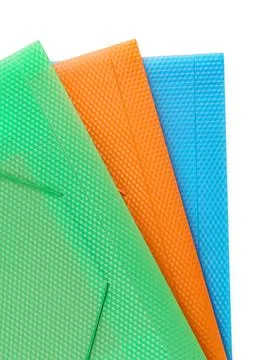 Three multi-colored folders isolated with clipping path Foto stock