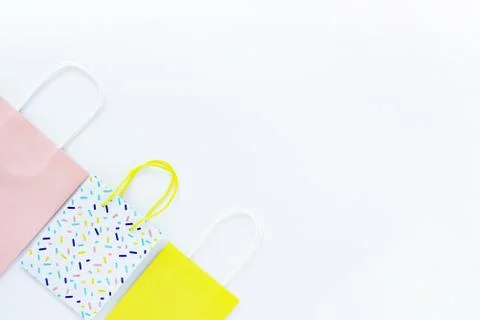 Three multi-colored gift bags on a white background. concept of gifts, purchases 写真素材
