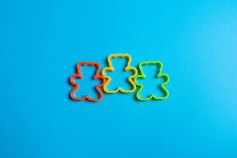Three multi-colored plastic cookie cutter for making cookies in the shape of  Stock Photos