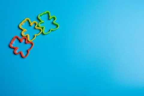Three multi-colored plastic cookie cutter for making cookies in the shape of  Stock Photos