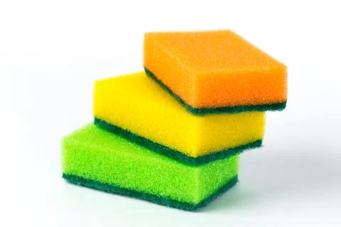 Three multi-colored sponges for washing dishes isolated on white background Stock Photos