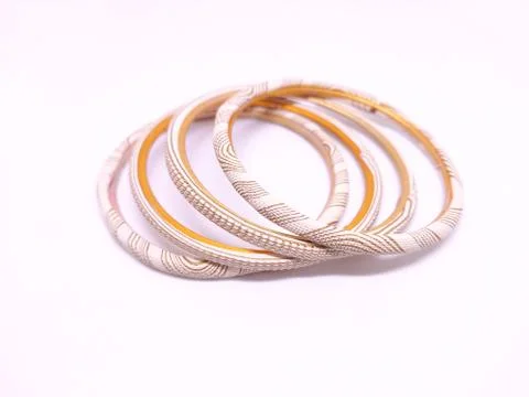 Three multicolored Bangles isolated on white background. Bangles are traditio Stock Photos