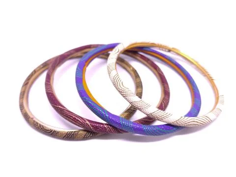 Three multicolored Bangles isolated on white background. Bangles are traditio Stock Photos