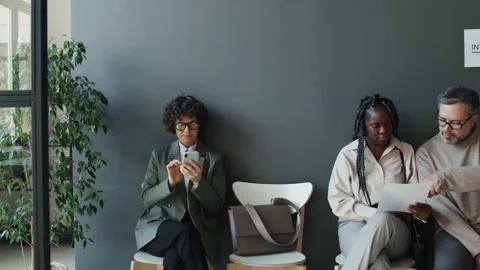 Three Multiethnic People Wainting For Interview Stock Footage 236700727