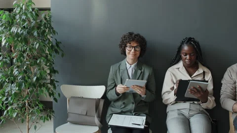 Three Mutiethnic People Waiting For Interview Caucasian Woman Smiling At Camera Stock Footage 236702577