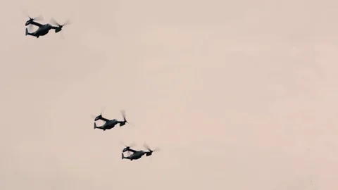Three MV-22 Ospreys flying over Marine Corps Base Hawaii Stock Footage 84257101