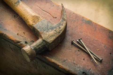 Three Nails and Hammer Stock-Fotos