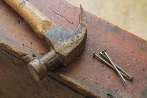 Three Nails and Hammer Stock Photos