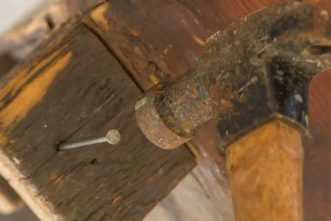 Three Nails and Hammer Stock Photos