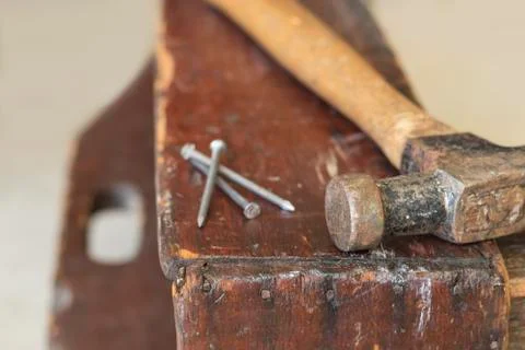 Three Nails and Hammer Stock Photos