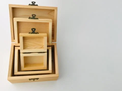 Three natural rubber brown empty wood boxes Stock Photos