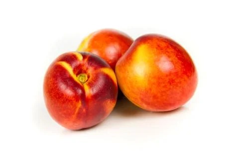 Three nectarines isolated Stock Photos