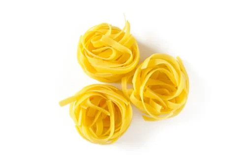 Three nests of tagliatelle Stock-Fotos