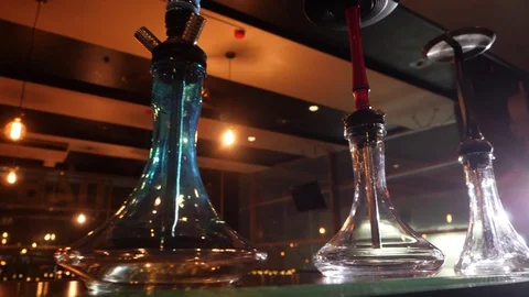 Three new hookahs in the bar in slow motion Stock Footage 122848419