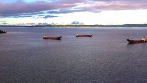 Three Nickel-Ore Extraction Mining Barges Operate on waters at Stock Footage 123912050