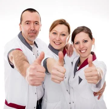 Three nurses demonstrate teamwork and success Fotos Stock