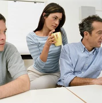 Three office workers Stock Photos