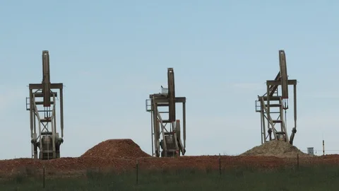 Three Oil Rigs Pumping North Dakota Fields Stock Footage 112944433
