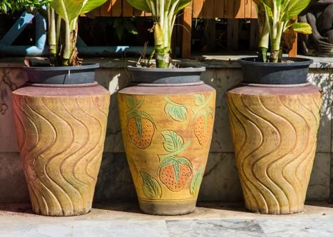Three old flower pots. Stock Photos