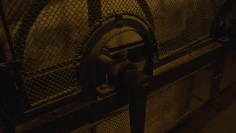 Three old industrial valves mounted into rusty metal grate. Industrial elements Video stock 301033291