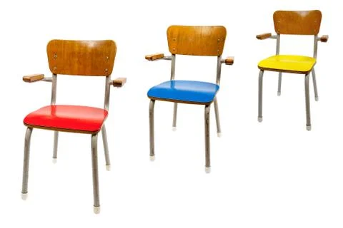 Three old school chairs Stock Photos
