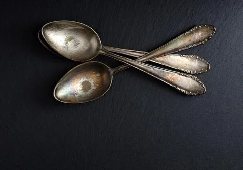 Three old teaspoons Stock Photos