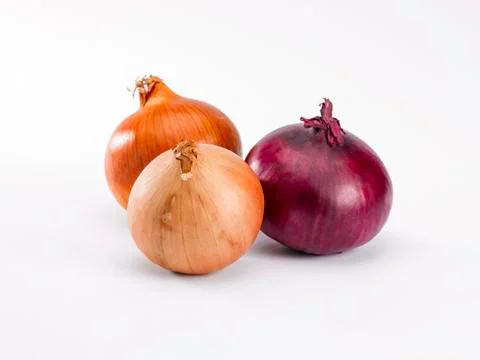 Three onions Stock Photos