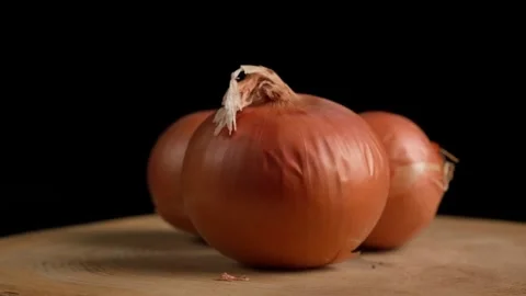Three Onions Rotating Stock Footage 284279167