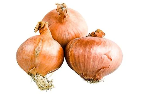 Three onions on a white isolated background. Foto stock