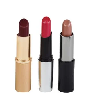 Three open bright lipstick assorted colors Stock Photos