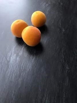 Three Orange apricots Foto stock