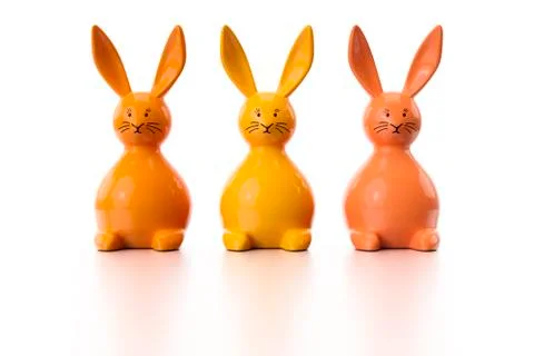 Three orange easter bunny figures Stockillustratie