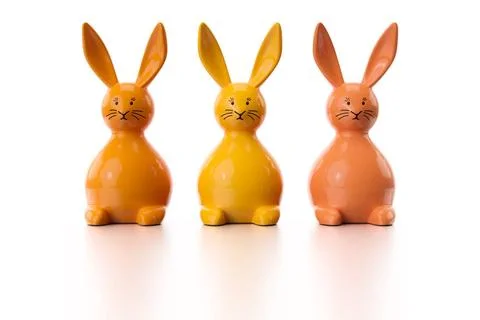 Three orange easter bunny figures 3d illustration of a three orange easter... Stock Photos